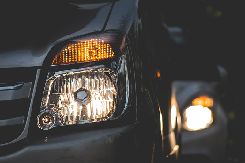 Reflector style automotive headlight