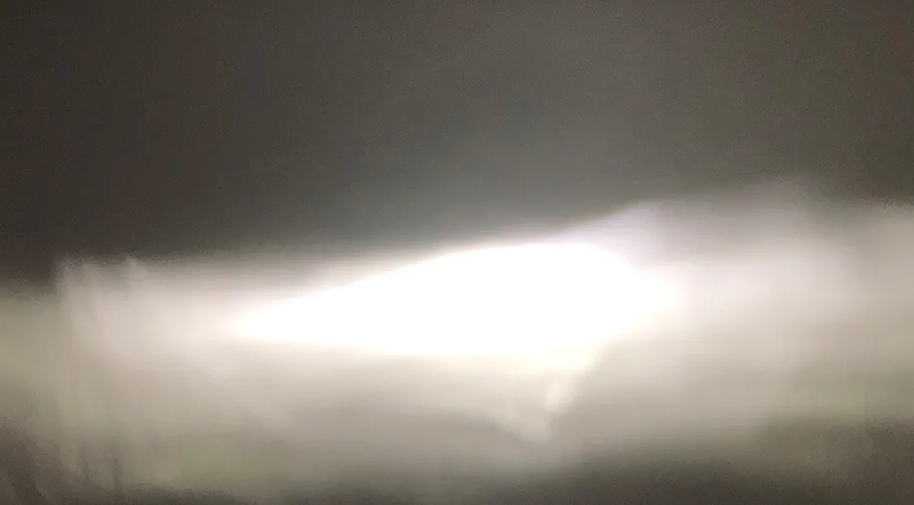 DeAutoLED Premium low-beam appearance on a wall in the original review